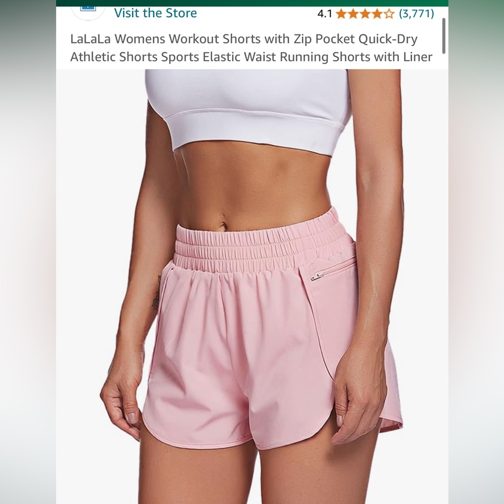 Pink running shorts with zipper pocket